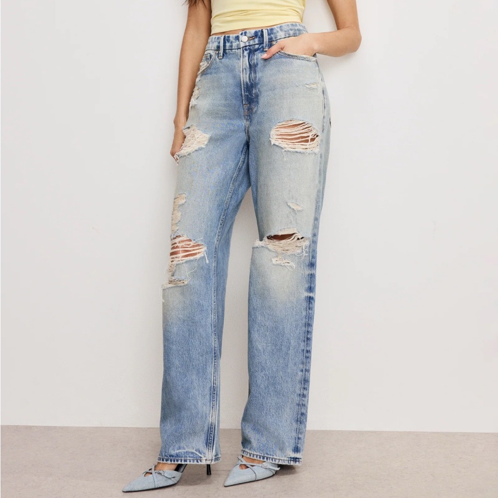 Good American relaxed jeans w/ mid-rise waist, & loose straight legs.